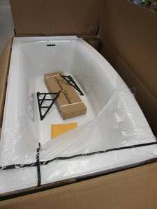lot 956 image: Ovation Curve 60 in. Right Drain Rectangular Apron Front Bathtub in Arctic White (LARGE CRACK, SEE PHOTOS)