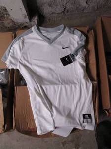 lot 24 image: Box of Girls Nike Softball Jerseys...