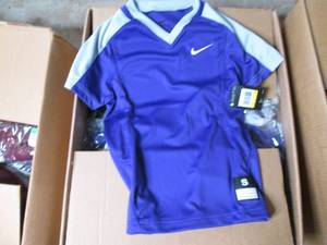 lot 26 image: Box of Nike girls softball jerseys ...