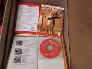 lot 126 image: Box of Through a Dogs Ear Books...