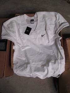 lot 138 image: Case of Nike Mens football jerseys...
