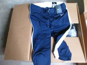 lot 140 image: Case of Nike mens football pants s...