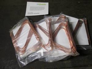 lot 150 image: 10 in Vitamin copper tongue scraper...