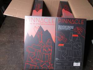 lot 186 image: Case of 4 new Pinnacle games...
