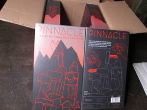 lot 192 image: Case of 4 new Pinnacle games...