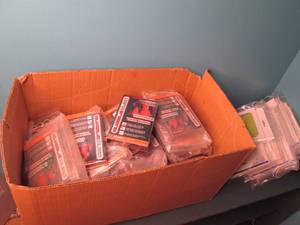 lot 201 image: Rumble Buds Gaming Earbuds & Box of Samsung Galaxy Tab 3 Book Co...