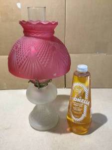 lot 68 image: Vintage oil lamp with red shade