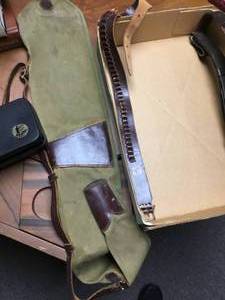 lot 143 image: gun cleaning kit belts and case sleeve