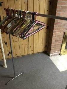 lot 153 image: Clothes hanging rack with Hangers