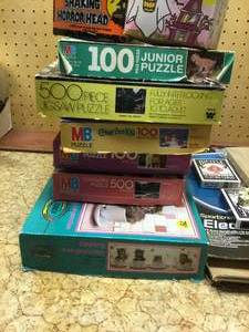 lot 186 image: assorted vintage games and puzzles and dart board