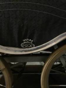 lot 188 image: Vintage Rex Strollo-o-Chair baby stroller, highchair and base.