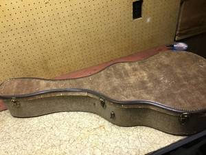 lot 191 image: Vintage Harmony master guitar with case.
