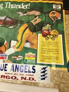 lot 195 image: 2 NDSU poster from 1993. Blue Angels bumper sticker