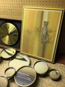 lot 220 image: Bulova Clock Mirrors picture of a jaguar wooden shelf