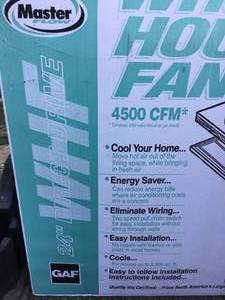 lot 39 image: Master Whole house fan 24 belt drive with shutters