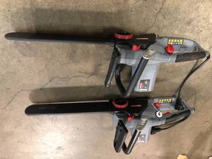 Lot of 2 Oregon CS1500 Self-Sharpening 15 Amp Corded Electric Chainsaw, 18 in. Bar, Equipped with PowerSharp Saw Chain Customer Returns See Terms on Auction