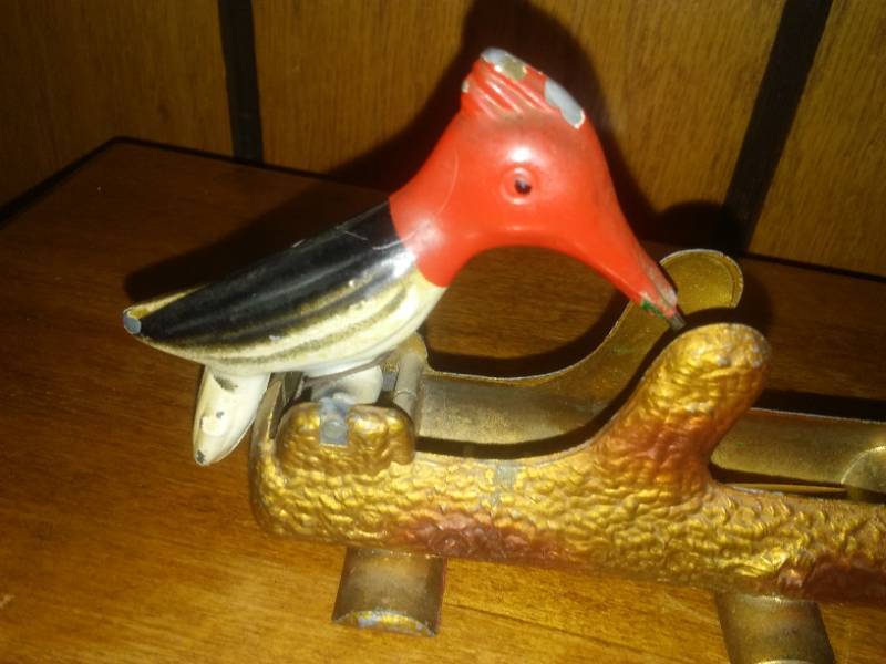 Antique metal Woodpecker toothpick grabber, excellent.