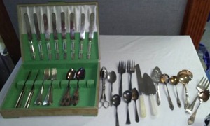 Flat Ware For 12 (Minus Spoons)