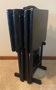 lot 51 image: Wonderful Black Wooden 4 Tray Table Set