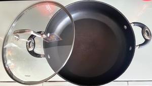 lot 96 image: Cuisinart Skillet with Lid and 4 Vibrant Red Crocks by BIA
