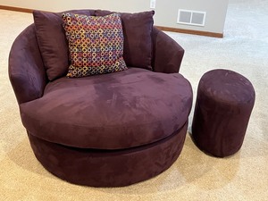 lot 6 image: Contemporary Style Deep Purple Suede Chair and Ottoman