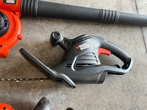 lot 110 image: Three Piece Electric Set Black and Decker Trimmers and Leaf Blower