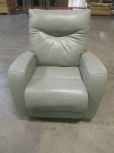 CREATED FOR MACYs FABRIQUE PAR FURNITURE Leather Upholstered  Power Reclining Arm Chair. Rocks and Swivels., Slight Burn In back bottom (See Photos) Approximate Dimensions 34 x 34 x 35 Tall.
