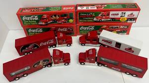 Group Of 4 Vintage Die-Cast Coca Cola Semi Trucks NIB