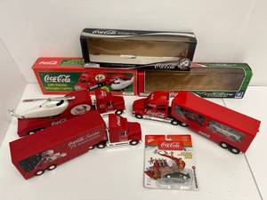 Group Including 3 Vintage Die-Cast Coca Cola Semi Trucks NIB And More