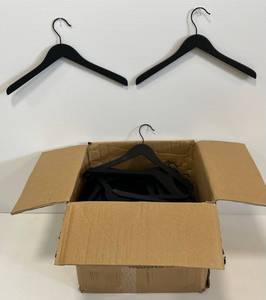 Group Of Black Wood Shirt Hangers