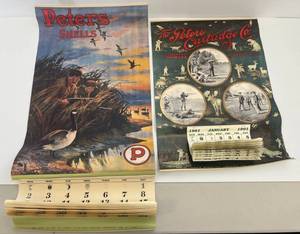 Two Vintage Reproduction Calendars 1 1991 reproduction Of The 1901 The Peters Cartridge Co. And 1 1994 Reproduction Of 1910 Peters Shells