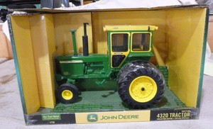 lot 16 image: John Deere 4320 Die-Cast Metal Tractor
