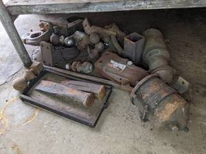 lot 60 image: Pile of Trailer Hitches in Various Sizes