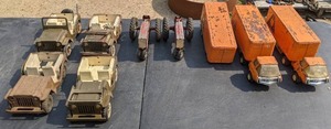 lot 42 image: Vintage Toys  (4) Military Tonka Jeeps, (2) Red Tractors, (2) Allied Van Lines Trucks with Trailer and (1) Spare Allied Trailer