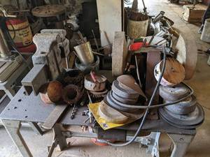 lot 81 image: Vintage Mixed Tool Lot Desmond Stephan Mfg. Co. Bench Vise, Grinder, Hole Saw Bits, Metal Shop Bench, and More