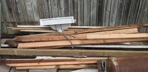 lot 144 image: Assortment of Lumber and Sink with Faucet
