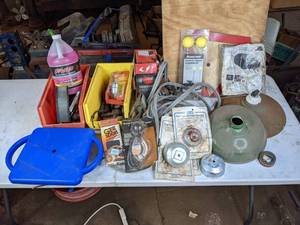 lot 211 image: Miscellaneous Car CareRepair Items - Antifreeze, AntifreezeCoolant Tester, Magnetic Trailer Alignment Kit, Air Filter, Battery Charger, Gauges, and More