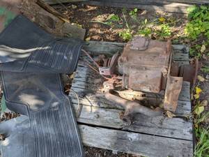 lot 272 image: Black Vehicle Rubber Floor Mats and Vintage Vehicle Motor Parts