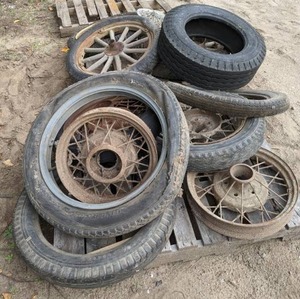 lot 171 image: Variety of Vintage Tires, Rims, and Hubcaps