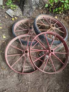 lot 261 image: (4) Vintage Farm Cart Wheels