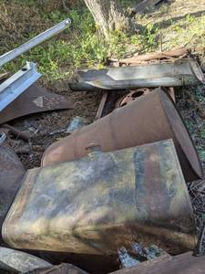 lot 366 image: Large Lot of Vintage Automotive Parts, Tanks, Rims, Barrel, and More