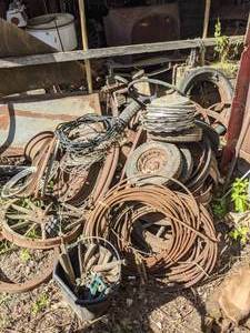 lot 353 image: Large Lot of Scrap Metal, Tires, Wheels, Rims, Wire, Cable, Hubcaps, Steering Wheel, and More