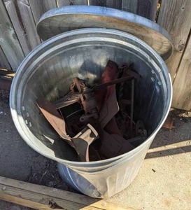 lot 348 image: Galvanized Trash Can with Lid includes Contents Believed to be Vintage Dodge Parts