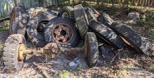 lot 372 image: Assortment of Scrap Tires, Rims, Axles, and More