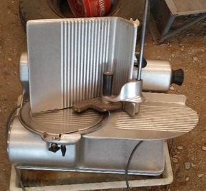 lot 395 image: Stainless Commercial Meat Slicer.