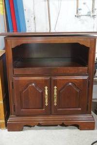 lot 32 image: Small wooden TV stand