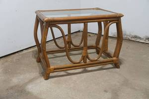 lot 36 image: Bamboo coffee table with glass top