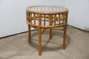 lot 37 image: Round Bamboo end table with glass top