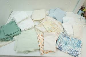 lot 94 image: variety of clean bed sheets