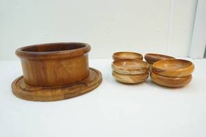 lot 135 image: Wooden bowl set, cutting board, and teakwood bowl